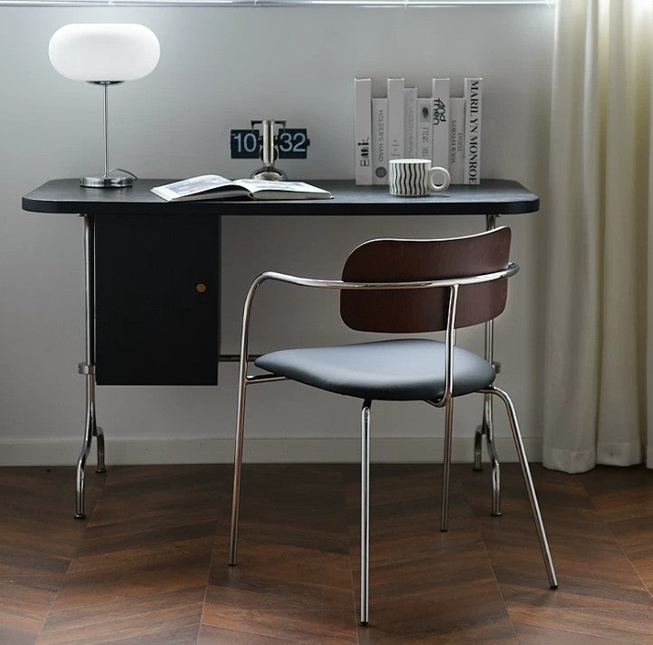 dining arm chair with sleek bent steel arm
