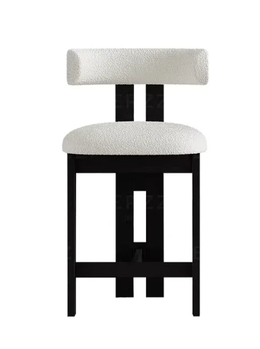 Modern DEVAL bar chair upholstered in soft bouclé fabric with wooden legs