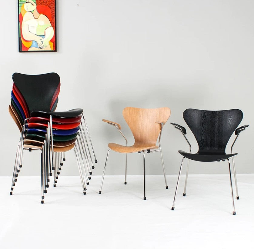 Modern stackable chairs in black, wood, and colorful options for home or office use