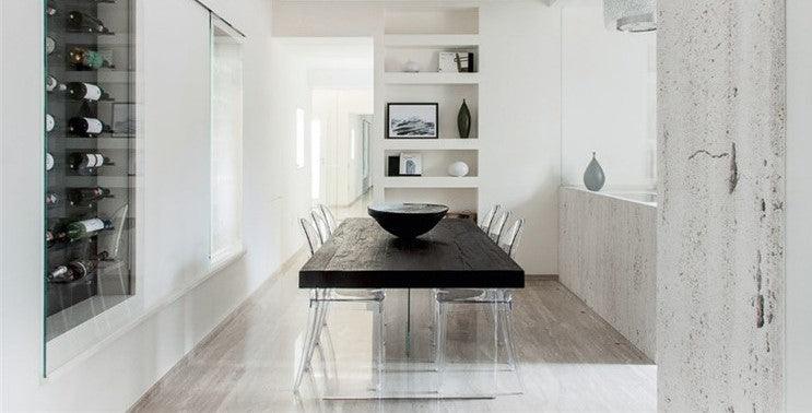 black dining table with acrylic transparent legs