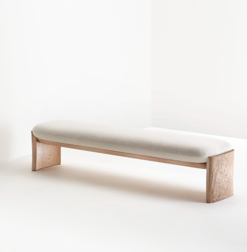 Deepa modern dining bench with high-resilience foam cushioning in white wash.