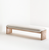 Deepa modern dining bench with high-resilience foam cushioning in white wash.