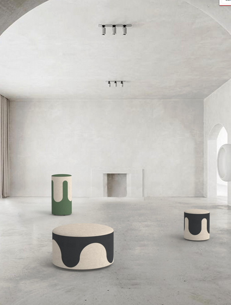 Round dual-tone upholstered drip fluid pouf with flowing design for breakout spaces