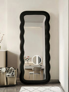 black fabric upholstered mirror
