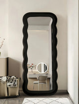 black fabric upholstered mirror