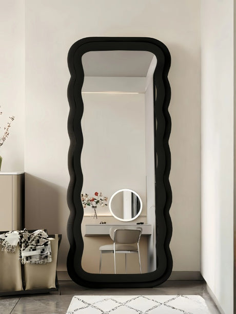 black fabric upholstered mirror