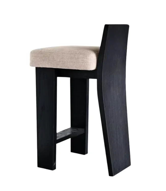 Black bar stool with beige cushioned seat 