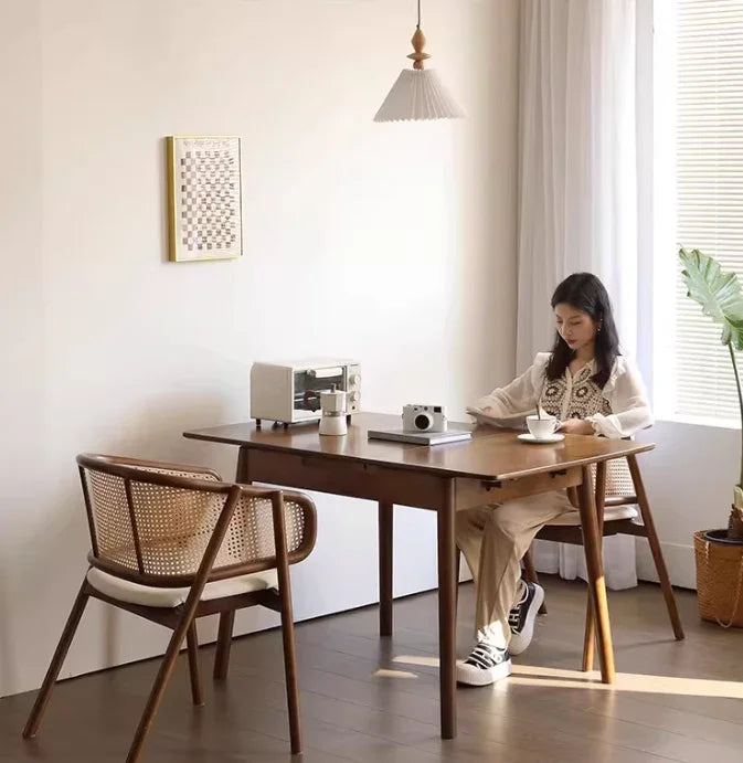 Riva rattan dining chair in walnut color.