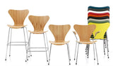 Modern wooden shell chairs with chrome legs, stackable designs in multiple colors for home or office use