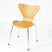 Modern wooden chair with chrome legs, sleek design for home or office use