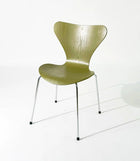 Modern olive wood dining chair with chrome legs, stylish home or office seating