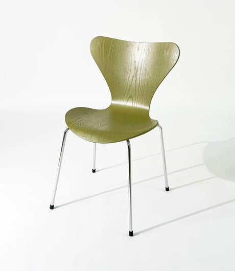 Modern olive wood dining chair with chrome legs, stylish home or office seating