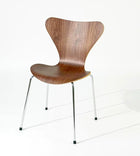 Modern wooden chair with chrome legs, stylish home or office furniture design