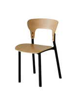 A modern dining chair with a light natural wood seat and backrest, supported by black metal legs, shown against a plain white background.
