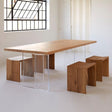 solid wood dining table with transparent legs