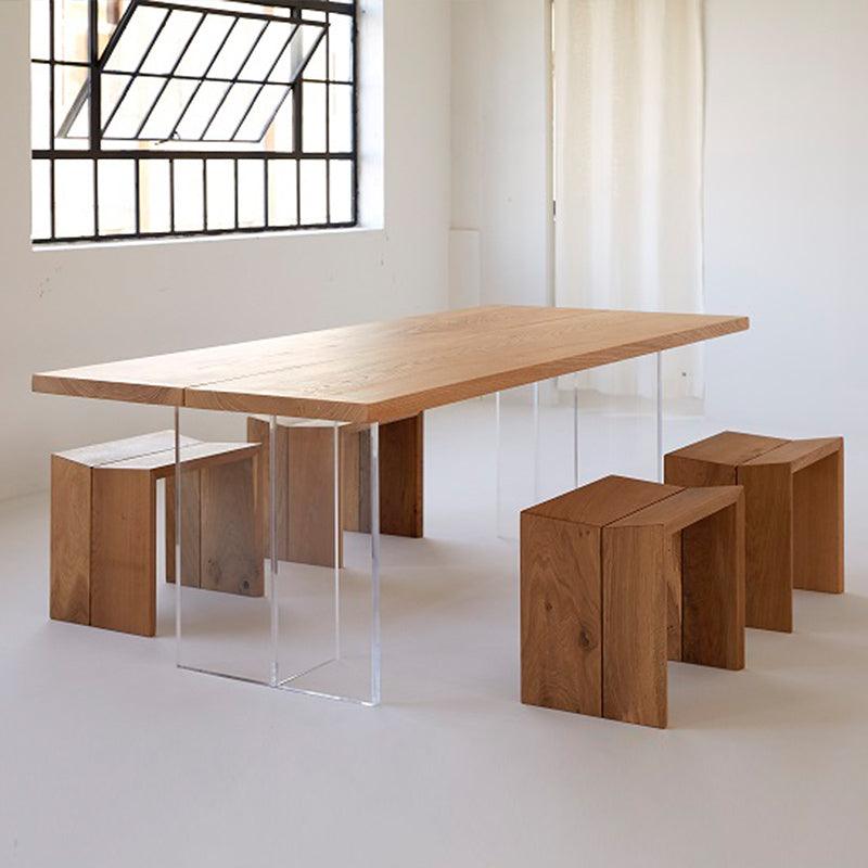solid wood dining table with transparent legs