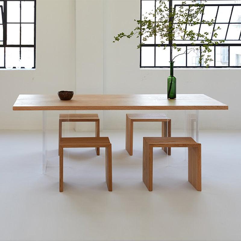 minimalist table with acrylic transparent legs