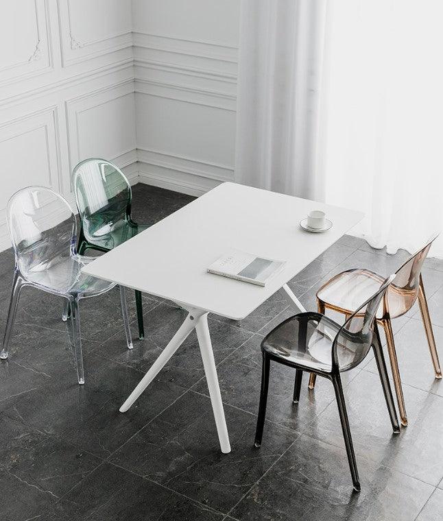 transparent white chairs