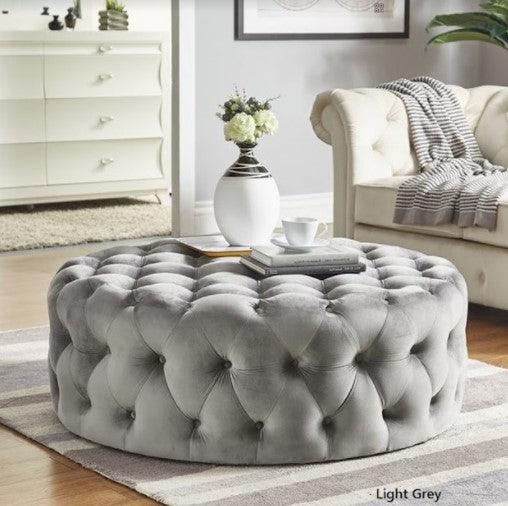 grey tufted round ottoman