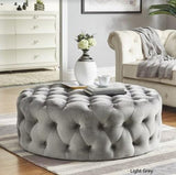 grey tufted round ottoman