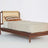 solid wood bedframe with rattan headboard