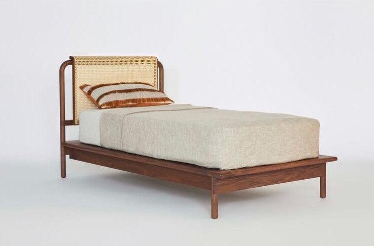 solid wood bedframe with rattan headboard