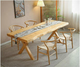 wood dining table and wishbone chair