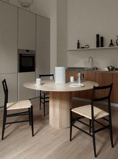 minimalist round solid wood dining table